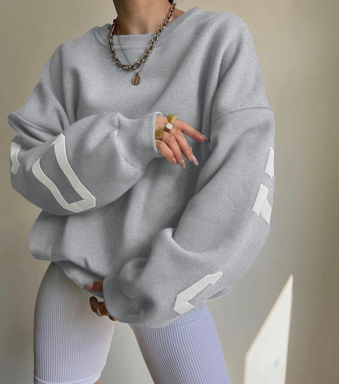 Langärmelige O-Neck-Pullover