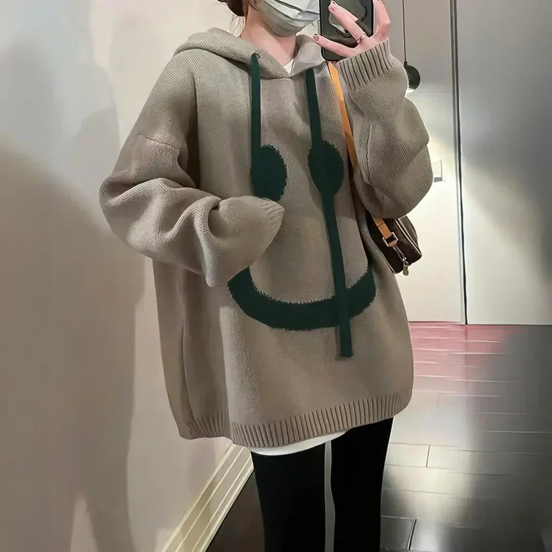 Joy | Hoodie mit lächelndem Gesicht-Design
