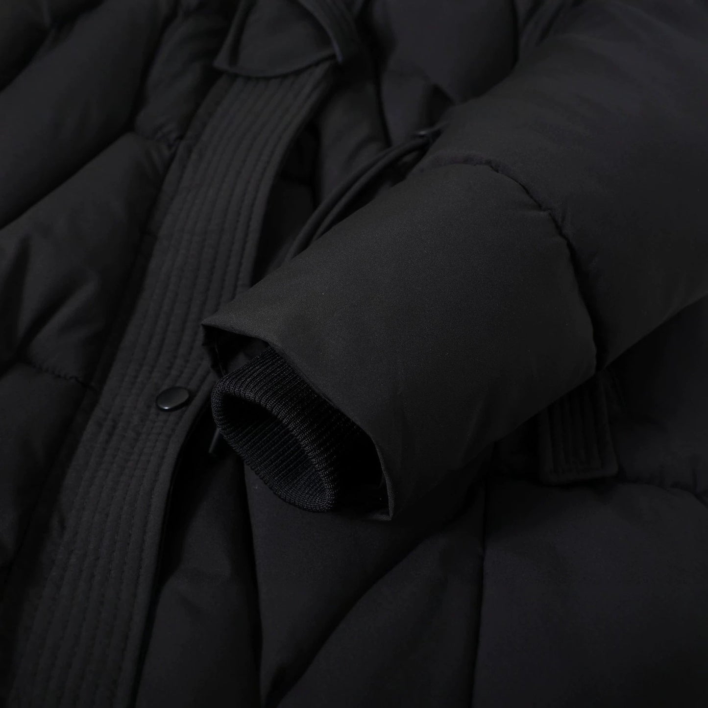 Damen langer gesteppter Parka mit Kunstfellkapuze und Kordelzug