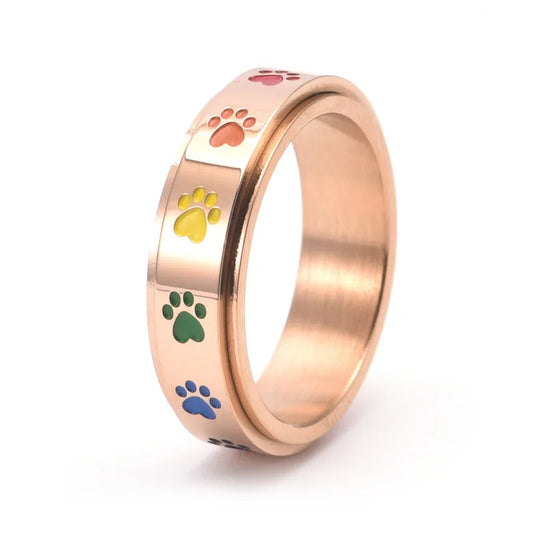 Drehbarer Anti-Stress Pfoten-Ring – Edelstahl mit Regenbogen-Pfoten