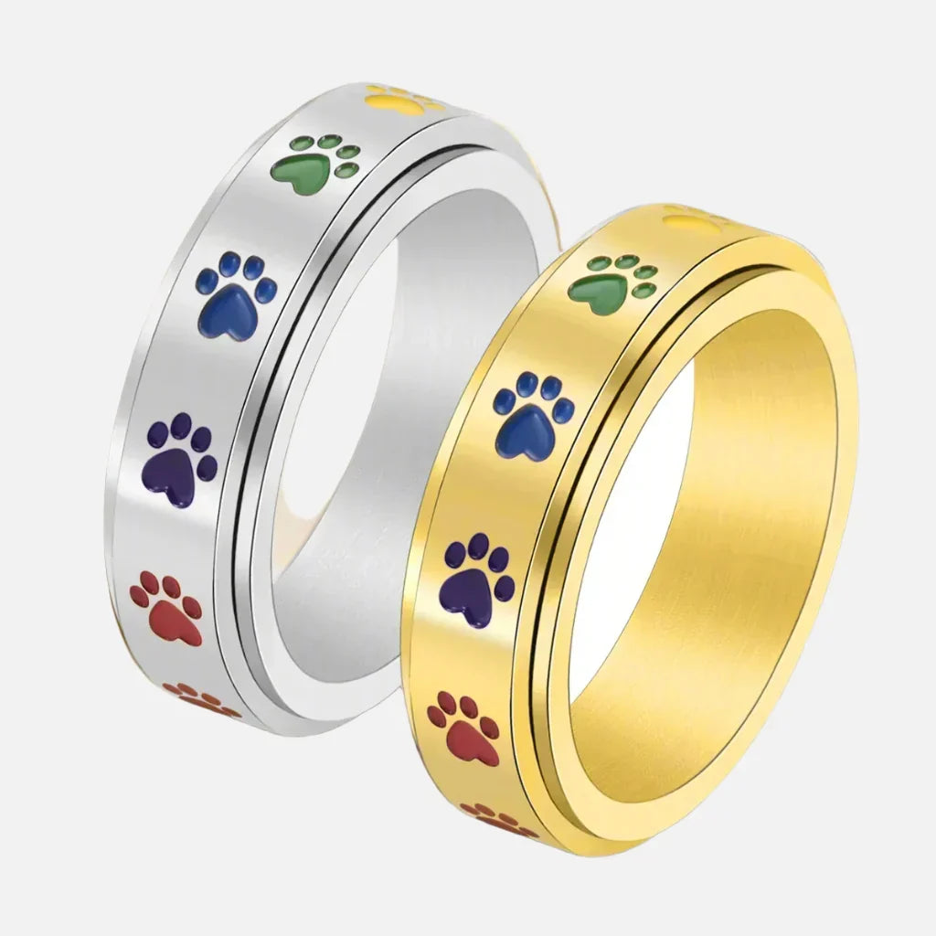 Drehbarer Anti-Stress Pfoten-Ring – Edelstahl mit Regenbogen-Pfoten